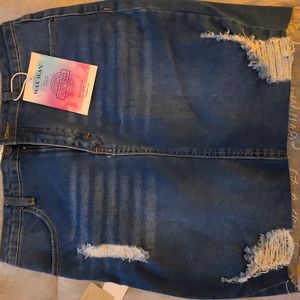 3 mini skirts denim, black denim , light denim and medium blue denim.